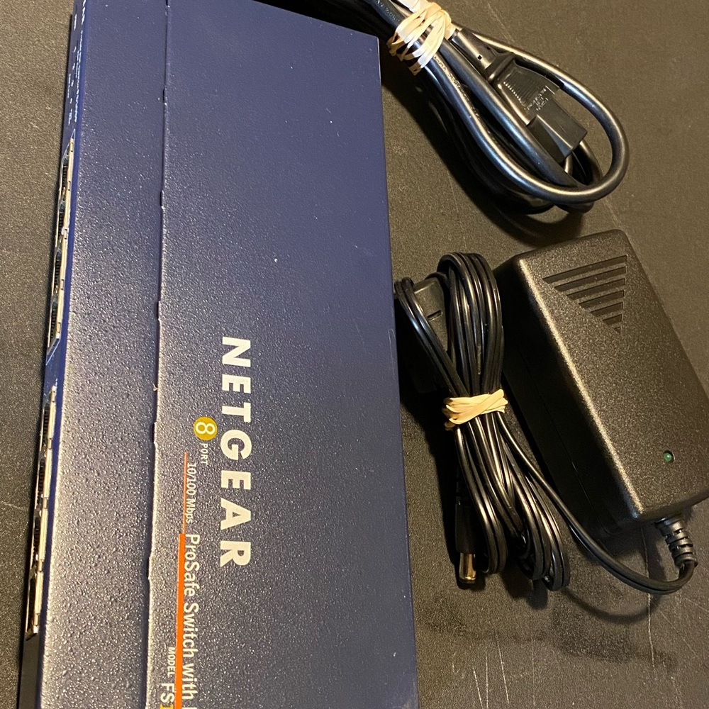 Netgear Dark Blue Ethernet Switch with Adapter